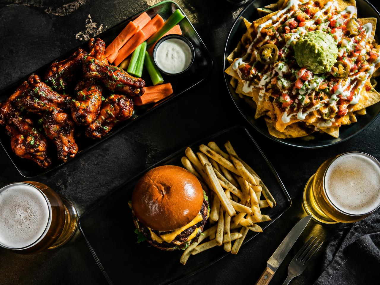 Wings, burger, nachos and cold beer